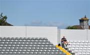 3 September 2023; A spectator takes his seat in the newly redevelopment North Stand before the Waterford County Senior Club Hurling Championship Semi-Final match between De La Salle and Roanmore at Walsh Park in Waterford. Photo by Seb Daly/Sportsfile