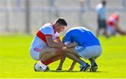 3 September 2023; Ethan Flynn of Roanmore, right, is consoled by Reuben Halloran of De La Salle after the Waterford County Senior Club Hurling Championship Semi-Final match between De La Salle and Roanmore at Walsh Park in Waterford. Photo by Seb Daly/Sportsfile