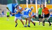 3 September 2023; Jack Twomey of De La Salle is tackled by Roanmore players Sean Burke, left, and Brian Nolan during the Waterford County Senior Club Hurling Championship Semi-Final match between De La Salle and Roanmore at Walsh Park in Waterford. Photo by Seb Daly/Sportsfile