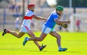 3 September 2023; Billy Nolan of Roanmore in action against Eddie Meaney of De La Salle during the Waterford County Senior Club Hurling Championship Semi-Final match between De La Salle and Roanmore at Walsh Park in Waterford. Photo by Seb Daly/Sportsfile