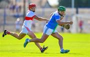 3 September 2023; Billy Nolan of Roanmore in action against Eddie Meaney of De La Salle during the Waterford County Senior Club Hurling Championship Semi-Final match between De La Salle and Roanmore at Walsh Park in Waterford. Photo by Seb Daly/Sportsfile