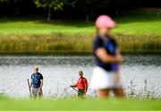 3 September 2023; Paddleboarders watch from the lake during day four of the KPMG Women's Irish Open Golf Championship at Dromoland Castle in Clare. Photo by Eóin Noonan/Sportsfile