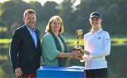 3 September 2023; Smilla Tarning Sønderby of Denmark, right, is presented with a trophy by Sport Ireland chief executive Dr Una May and KPMG managing partner Seamus Hand after day four of the KPMG Women's Irish Open Golf Championship at Dromoland Castle in Clare. Photo by Eóin Noonan/Sportsfile