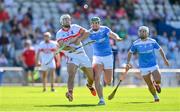 3 September 2023; Thomas Douglas of De La Salle in action against Billy Nolan of Roanmore during the Waterford County Senior Club Hurling Championship Semi-Final match between De La Salle and Roanmore at Walsh Park in Waterford. Photo by Seb Daly/Sportsfile