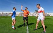 3 September 2023; Referee Thomas Walsh with team captains Brian Nolan of Roanmore, left, and Eddie Barrett of De La Salle before the Waterford County Senior Club Hurling Championship Semi-Final match between De La Salle and Roanmore at Walsh Park in Waterford. Photo by Seb Daly/Sportsfile