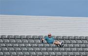 3 September 2023; A spectator in his seat in the newly redeveloped North Stand before the Waterford County Senior Club Hurling Championship Semi-Final match between De La Salle and Roanmore at Walsh Park in Waterford. Photo by Seb Daly/Sportsfile