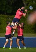 5 September 2023; Iain Henderson is lifted by Josh van der Flier, left, and Finlay Bealham during an Ireland rugby squad training session at Complexe de la Chambrerie in Tours, France. Photo by Brendan Moran/Sportsfile