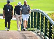 5 September 2023; Shane Lowry of Ireland, centre, walks to the first green during a practice round in advance of the Horizon Irish Open Golf Championship at The K Club in Straffan, Kildare. Photo by Eóin Noonan/Sportsfile