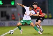 17 August 2023; Serikzhan Muzhikov of Tobol and Adam O'Reilly of Derry City during the UEFA Europa Conference League Third Qualifying Round second leg match between Derry City and FC Tobol at Tallaght Stadium in Dublin. Photo by Ben McShane/Sportsfile