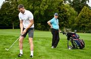 6 September 2023; Former Dublin footballer Barney Rock, watches his son Dean Rock, who he is caddie for, prepare to hit his second shot on the 18th fairway during the Pro-Am event in advance of the Horizon Irish Open Golf Championship at The K Club in Straffan, Kildare. Photo by Eóin Noonan/Sportsfile