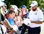 6 September 2023; Shane Lowry of Ireland signs autographs on the way to the 10th tee box during the Pro-Am event in advance of the Horizon Irish Open Golf Championship at The K Club in Straffan, Kildare. Photo by Eóin Noonan/Sportsfile