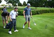 6 September 2023; Tapio Pulkkanen of Finland, right, and comedian Conor Moore with a hurley off on the seventh tee box during the Pro-Am event in advance of the Horizon Irish Open Golf Championship at The K Club in Straffan, Kildare. Photo by Eóin Noonan/Sportsfile