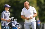 6 September 2023; Former Ireland rugby player Rory Best and his son Ben, who is his caddie, walk down the sixth fairway during the Pro-Am event in advance of the Horizon Irish Open Golf Championship at The K Club in Straffan, Kildare. Photo by Eóin Noonan/Sportsfile