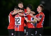 6 September 2023; Will Patching of Derry City celebrates with teammates after scoring their side's second goal during the SSE Airtricity Men's Premier Division match between UCD and Derry City at UCD Bowl in Dublin. Photo by Ben McShane/Sportsfile