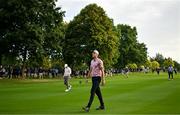 7 September 2023; Adrian Meronk of Poland walks down the 11th fairway alongside Rory McIlroy of Northern Ireland during day one of the Horizon Irish Open Golf Championship at The K Club in Straffan, Kildare. Photo by Eóin Noonan/Sportsfile