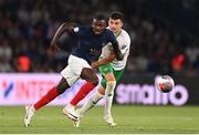 7 September 2023; Marcus Thuram of France in action against John Egan of Republic of Ireland during the UEFA EURO 2024 Championship qualifying group B match between France and Republic of Ireland at Parc des Princes in Paris, France. Photo by Stephen McCarthy/Sportsfile