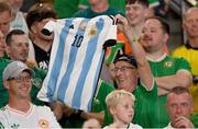 7 September 2023; A Republic of Ireland supporter holds up an Argentina jersey during the UEFA EURO 2024 Championship qualifying group B match between France and Republic of Ireland at Parc des Princes in Paris, France. Photo by Stephen McCarthy/Sportsfile