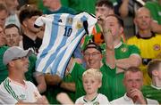 7 September 2023; A Republic of Ireland supporter holds up an Argentina jersey during the UEFA EURO 2024 Championship qualifying group B match between France and Republic of Ireland at Parc des Princes in Paris, France. Photo by Stephen McCarthy/Sportsfile