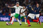 7 September 2023; Aaron Connolly of Republic of Ireland in action against Dayot Upamecano of France during the UEFA EURO 2024 Championship qualifying group B match between France and Republic of Ireland at Parc des Princes in Paris, France. Photo by Seb Daly/Sportsfile