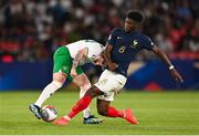 7 September 2023; Aaron Connolly of Republic of Ireland is tackled by Aurélien Tchouameni of France during the UEFA EURO 2024 Championship qualifying group B match between France and Republic of Ireland at Parc des Princes in Paris, France. Photo by Stephen McCarthy/Sportsfile