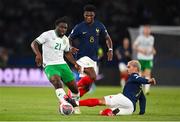 7 September 2023; Festy Ebosele of Republic of Ireland is tackled by Antoine Griezmann of France during the UEFA EURO 2024 Championship qualifying group B match between France and Republic of Ireland at Parc des Princes in Paris, France. Photo by Seb Daly/Sportsfile