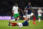 7 September 2023; Festy Ebosele of Republic of Ireland is tackled by Antoine Griezmann of France during the UEFA EURO 2024 Championship qualifying group B match between France and Republic of Ireland at Parc des Princes in Paris, France. Photo by Seb Daly/Sportsfile