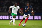 7 September 2023; Festy Ebosele of Republic of Ireland in action against Aurélien Tchouameni of France during the UEFA EURO 2024 Championship qualifying group B match between France and Republic of Ireland at Parc des Princes in Paris, France. Photo by Seb Daly/Sportsfile