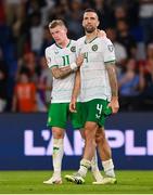 7 September 2023; James McClean, left, and Shane Duffy of Republic of Ireland after the UEFA EURO 2024 Championship qualifying group B match between France and Republic of Ireland at Parc des Princes in Paris, France. Photo by Seb Daly/Sportsfile