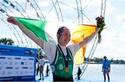 8 September 2023; Siobhan McCrohan of Ireland celebrates with the Irish tricolour and her gold medal after finishing first with a time of 8:47.96 in the Lightweight Women's Single Sculls final A during the 2023 World Rowing Championships at Ada Ciganlija regatta course on Sava Lake, Belgrade. Photo by Nikola Krstic/Sportsfile