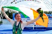 8 September 2023; Siobhan McCrohan of Ireland celebrates with the Irish tricolour and her gold medal after finishing first with a time of 8:47.96 in the Lightweight Women's Single Sculls final A during the 2023 World Rowing Championships at Ada Ciganlija regatta course on Sava Lake, Belgrade. Photo by Nikola Krstic/Sportsfile