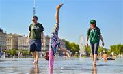 8 September 2023; Laragh Kelly, age 8, from Ballinteer in Dublin, does cartwheels while enjoying the sunshine with her parents Dearhla Whyte and David Kelly in Bordeaux, France, ahead of Ireland's first Rugby World Cup 2023 game against Romania. Photo by Brendan Moran/Sportsfile