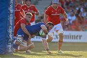 8 September 2023; Jason Jenkins of Leinster scores his side's first try despite the tackle of Alex Kendellen of Munster during the pre-season friendly match between Munster and Leinster at Musgrave Park in Cork. Photo by Sam Barnes/Sportsfile