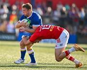 8 September 2023; Liam Turner of Leinster is tackled by Shane Daly of Munster during the pre-season friendly match between Munster and Leinster at Musgrave Park in Cork. Photo by Sam Barnes/Sportsfile