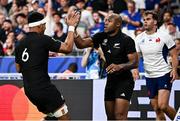 8 September 2023; Mark Telea of New Zealand celebrates with teammate Dalton Papali'i, left, after scoring their side's first try during the 2023 Rugby World Cup Pool A match between France and New Zealand at the Stade de France in Paris, France. Photo by Harry Murphy/Sportsfile