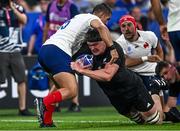 8 September 2023; Scott Barrett of New Zealand is tackled by Thomas Ramos of France during the 2023 Rugby World Cup Pool A match between France and New Zealand at the Stade de France in Paris, France. Photo by Harry Murphy/Sportsfile