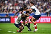 8 September 2023; Rieko Ioane of New Zealand is tackled by Yoram Moefana, left, and Damien Penaud of France during the 2023 Rugby World Cup Pool A match between France and New Zealand at the Stade de France in Paris, France. Photo by Harry Murphy/Sportsfile