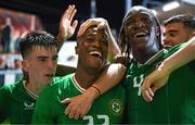 8 September 2023; Aidomo Emakhu of Republic of Ireland celebrates with team-mates Andrew Moran, left, and Bosun Lawal after scoring his side's third goal during the UEFA European Under-21 Championship Qualifier match between Republic of Ireland and Turkey at Turner’s Cross in Cork. Photo by Eóin Noonan/Sportsfile