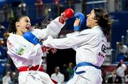 9 September 2023; Carlota Osorio Fernandez of Spain, left, in action against Khamis Reem of Germany during their 61kg Female Kumite in the World Karate Federation Karate 1 Premier League at the National Indoor Arena at Sport Ireland Campus, Dublin. Photo by Tyler Miller/Sportsfile