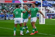 9 September 2023; Jamison Gibson-Park of Ireland celebrates with teammates Keith Earls, centre, and James Lowe after scoring their side's first try during the 2023 Rugby World Cup Pool B match between Ireland and Romania at Stade de Bordeaux in Bordeaux, France. Photo by Harry Murphy/Sportsfile