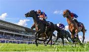 9 September 2023; Auguste Rodin, left, with Ryan Moore up, on their way to winning the Royal Bahrain Irish Champion Stakes, from second place Luxembourg, right, with Seamie Heffernan up, during day one of the Irish Champions Festival at Leopardstown Racecourse in Dublin. Photo by Seb Daly/Sportsfile