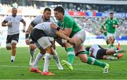 9 September 2023; Joe McCarthy of Ireland is tackled by Marius Simionescu of Romania during the 2023 Rugby World Cup Pool B match between Ireland and Romania at Stade de Bordeaux in Bordeaux, France. Photo by Brendan Moran/Sportsfile