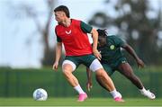 9 September 2023; Matt Doherty, left, and Festy Ebosele during a Republic of Ireland training session at the FAI National Training Centre in Abbotstown, Dublin. Photo by Stephen McCarthy/Sportsfile