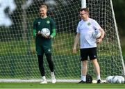 9 September 2023; Goalkeeper Caoimhin Kelleher and Andrew Morrissey, STATSports analyst, right, during a Republic of Ireland training session at the FAI National Training Centre in Abbotstown, Dublin. Photo by Stephen McCarthy/Sportsfile