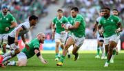 9 September 2023; Hugo Keenan of Ireland, right, takes a pass from teammate Jeremy Loughman during the 2023 Rugby World Cup Pool B match between Ireland and Romania at Stade de Bordeaux in Bordeaux, France. Photo by Brendan Moran/Sportsfile