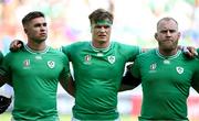 9 September 2023; Ireland players, from left, Jack Crowley, Josh van der Flier and Jeremy Loughman stand for the national anthems before the 2023 Rugby World Cup Pool B match between Ireland and Romania at Stade de Bordeaux in Bordeaux, France. Photo by Brendan Moran/Sportsfile