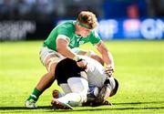 9 September 2023; Tudor Boldor of Romania is tackled by Josh van der Flier of Ireland during the 2023 Rugby World Cup Pool B match between Ireland and Romania at Stade de Bordeaux in Bordeaux, France. Photo by Harry Murphy/Sportsfile