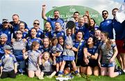 10 September 2023; The Breaffy GAA team celebrate with the trophy and friends & family after their side's victory in the GAA Rounders All Ireland Senior Finals match between Breaffy GAA and Glynn Barntown at Kinnegad GAA in Kinnegad, Westmeath. Photo by Tyler Miller/Sportsfile