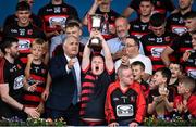 10 September 2023; Ballygunner supporter Tom Mullane lifts the cup after the Waterford County Senior Club Hurling Championship Final match between De La Salle and Ballygunner at Walsh Park in Waterford. Photo by David Fitzgerald/Sportsfile