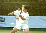 30 June 2004; Colin O'Brien, in action with his doubles partner .Barry King during the Danone Irish National Close Tennis Championships, James Magee and .James Cluskey.v.Colin O'Brien and .Barry King, Donnybrook Tennis Club, Dublin. Picture credit; Brendan Moran / SPORTSFILE