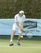 30 June 2004; James Magee, in action with his doubles partner .James Cluskey, during the Danone Irish National Close Tennis Championships, James Magee and .James Cluskey.v.Colin O'Brien and .Barry King, Donnybrook Tennis Club, Dublin. Picture credit; Brendan Moran / SPORTSFILE